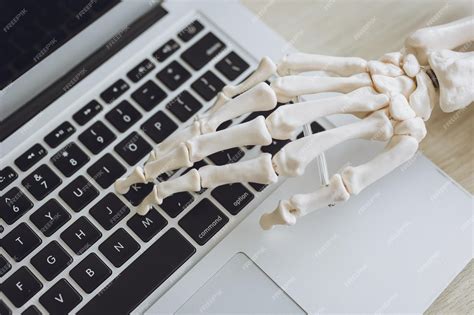 Premium Photo | Office syndrome concept skeleton hand bone joint wrist pain physical effect when ...