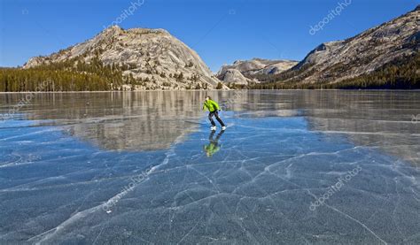 Frozen lake ice skating. — Stock Photo © gregepperson #8273676