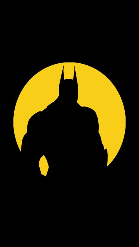 the batman logo is shown in front of a yellow and black background with an orange moon