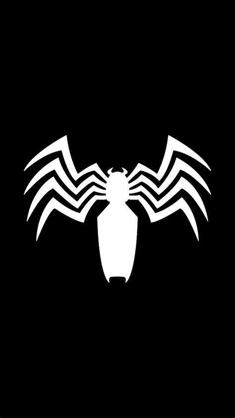 a spider logo on a black background