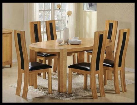 Mix traditional & modern with this Zeus solid Oak & Oak veneer oval dining table & 6 chairs to ...