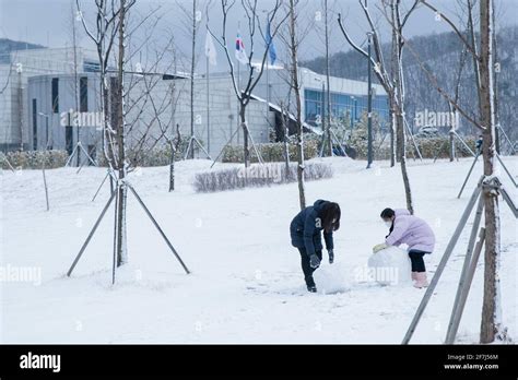 making snow with piled snow Stock Photo - Alamy