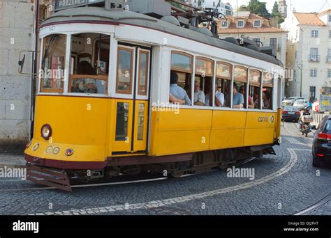 Old Lisbon tram in Alfama Stock Photo - Alamy