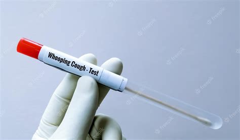 Premium Photo | Scientist holding swab sample for whooping cough test ...