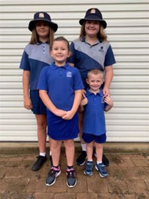 Smiles and sulks: Townsville kids’ first day at school | Daily Telegraph