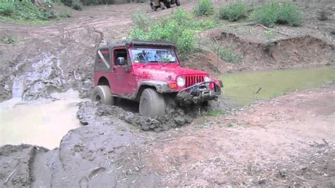 Jeep TJ Wrangler on 35's Bogged in the Mud | Messy - YouTube