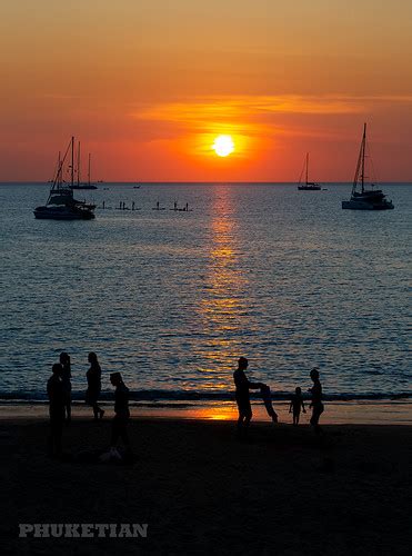 Sunset with yacht and catamaran. Nai Harn beach, Phuket is… | Flickr