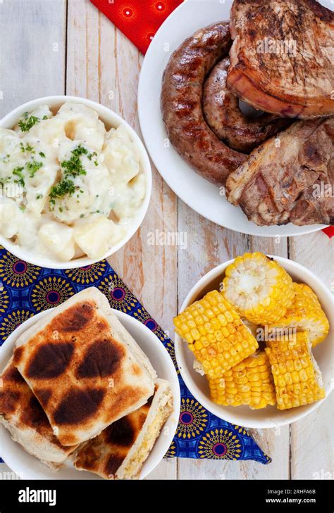 South African Braai Day or Heritage Day. Celebrating traditional braai food. Meat and sides with ...