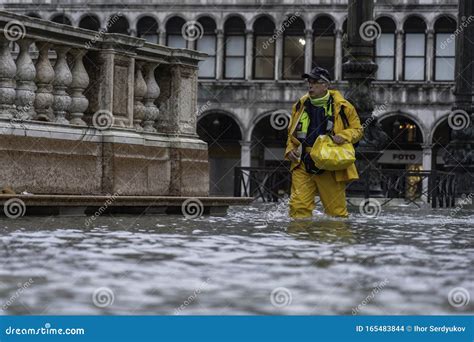 VENICE, ITALY - November 24, 2019: St. Marks Square Piazza San Marco during Flood Acqua Alta in ...