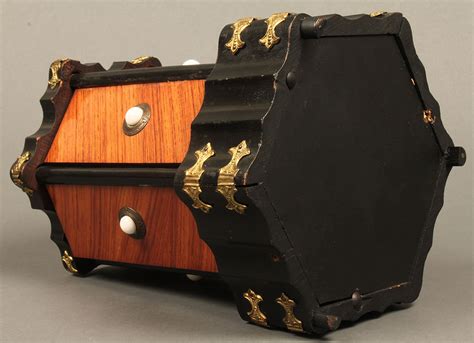 Lot 657: Rare pivoting kingwood sewing cabinet, tabletop | Case Auctions