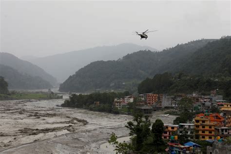 Flash floods kill 10 people in Bhutan, seven missing in Nepal | Reuters