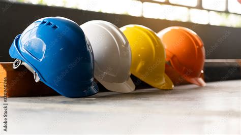 Safety Construction Worker Hats Blue, white, yellow, orange. Teamwork ...