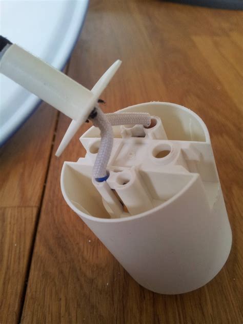 wiring - How can I remove the wires from this lamp holder? - Home Improvement Stack Exchange