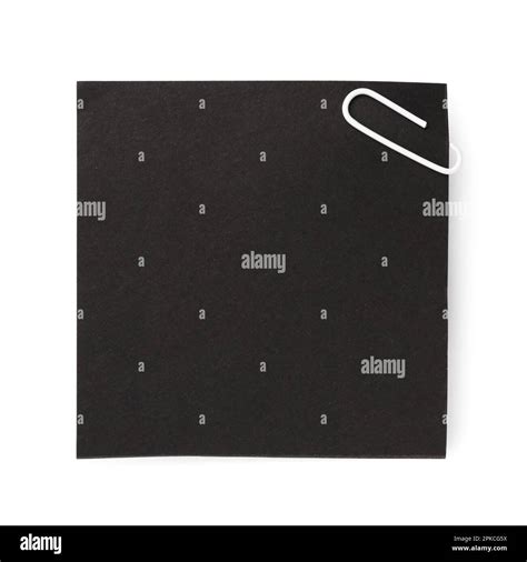 Black sticky note with paper clip on white background Stock Photo - Alamy