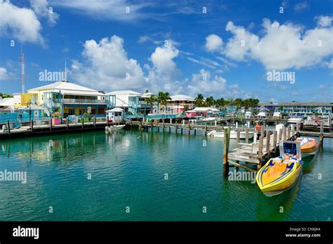 Bahamas, Grand Bahama Island, Freeport, Port Lucaya Marina, competition boats moored to a wooden ...