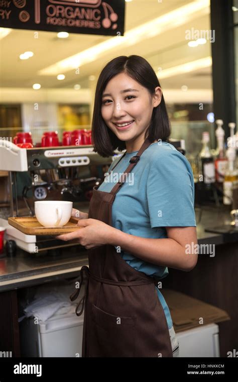 Coffee shop attendant Stock Photo - Alamy