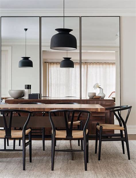 Love the black wishbone chairs | Mirror dining room, Dining room wall ...