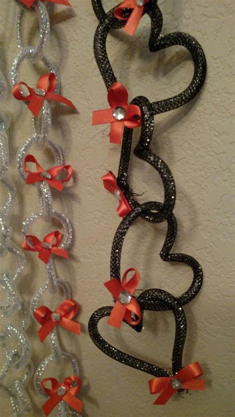 Homecoming mum spirit chains. Silver black and orange ribbons. Designed ...