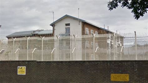 HMP Coldingley prisoners 'throw human waste out of cell windows' - BBC News