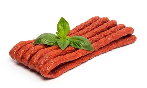 Premium Photo | Thin dry smoked pork or beef meat polish kabanos sausages isolated on white ...