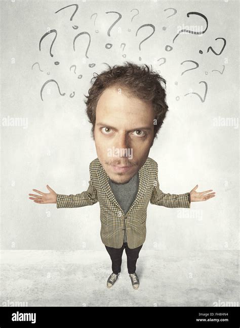 Big head person with question marks Stock Photo - Alamy