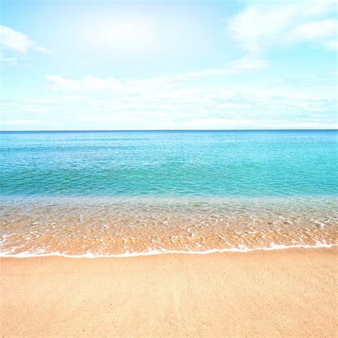 Sandy Beach with Calm Water Against Blue Skies. Stock Photo - Image of peace, natural: 47659306