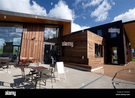 Solar-powered Timber Lodge Cafe in Queen Elizabeth Olympic Park, London Stock Photo - Alamy