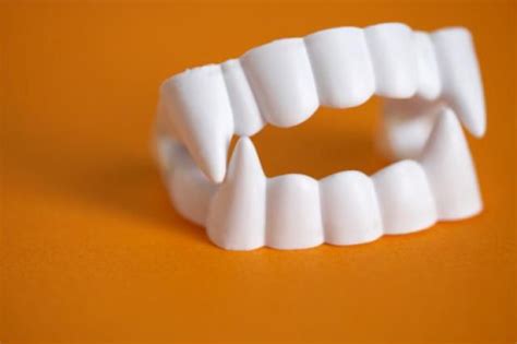 How to Make a Vampire Costume | Vampire teeth, Fake vampire teeth, Vampire fangs