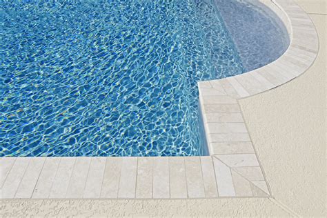 Top Benefits of Natural Stone Coping Around Your Fiberglass Pool