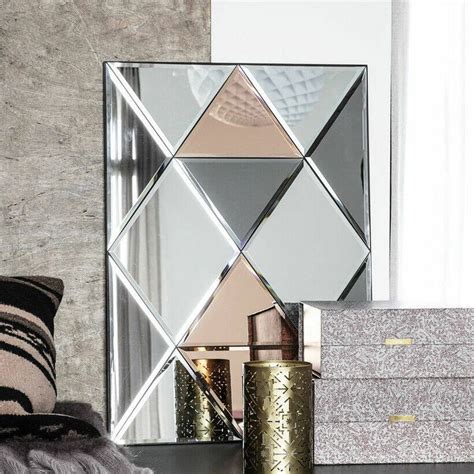 This goregous mirror is made from grey, clear and rose gold tinted pieces of glass. Use this ...