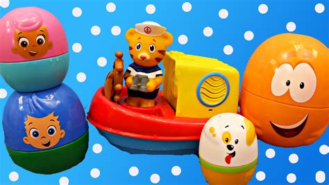 Bubble Guppies Surprise Eggs & Daniel Tigers Neighborhood Bath Toy Boat DisneyCarToys