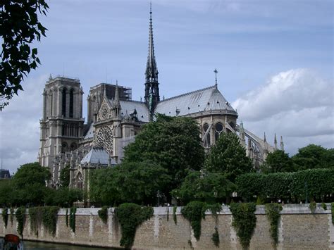 Free Stock photo of Notre Dame from the bank of the Seine River ...