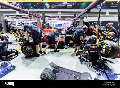 Formula One F1 Red Bull pit crew working on the garage during pit stop ...