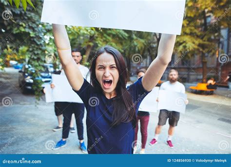 Group of Protesting Young People Outdoors Stock Photo - Image of ...