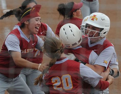 The Iowa State softball team celebrates after a 10-9 victory against ...