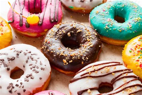 Delicious Donuts of Different Flavors Stock Photo - Image of glazed ...