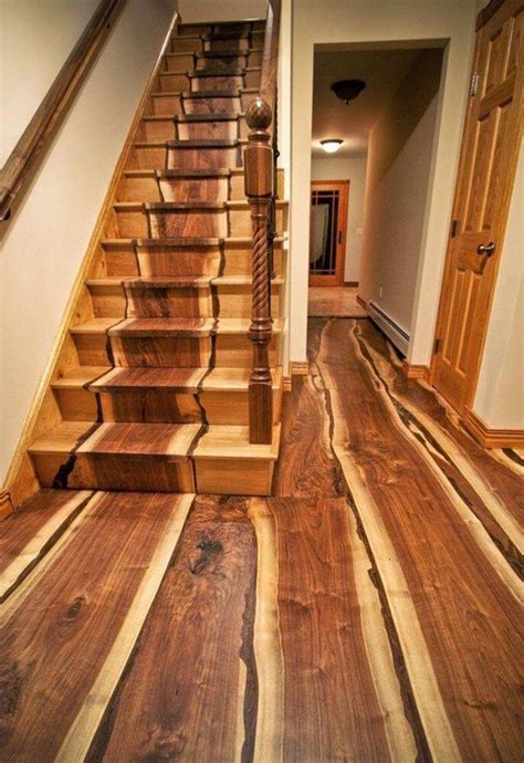 Beautiful wooden stairs with the wood inlaid into the construction to look like a runner. (With ...