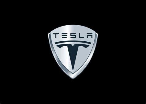 Download Tesla Logo in 4K Resolution Wallpaper | Wallpapers.com