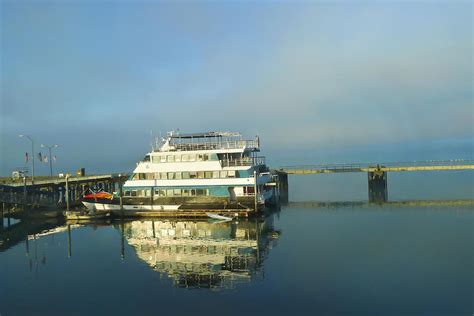 Small Ferry Boat In Wrangell Harbor Photograph by Betty Eich