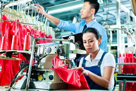 Seamstress And Shift Supervisor In Textile Factory Stock Image - Image ...