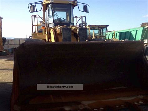 CAT 980 FII 1997 Wheeled loader Construction Equipment Photo and Specs