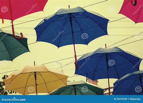 Some Bright Umbrellas in a Rainy Day Stock Image - Image of gala, hang ...