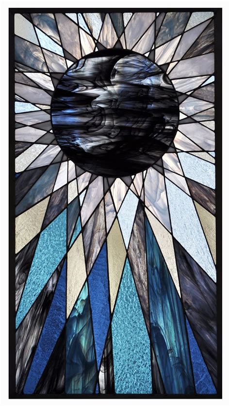 a stained glass window with an abstract design