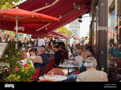 Cafes on the Champs Elysees in Paris Stock Photo - Alamy