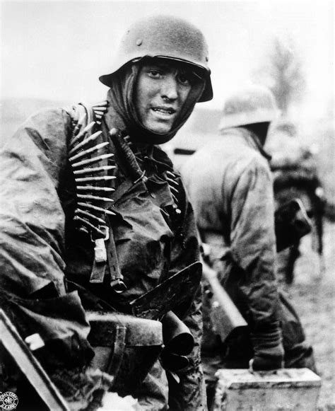 German machine gunner marching through the Ardennes in the Battle of the Bulge image - Free ...