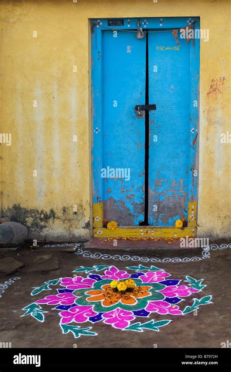 Rangoli sankranti festival design outside a rural Indian village house ...