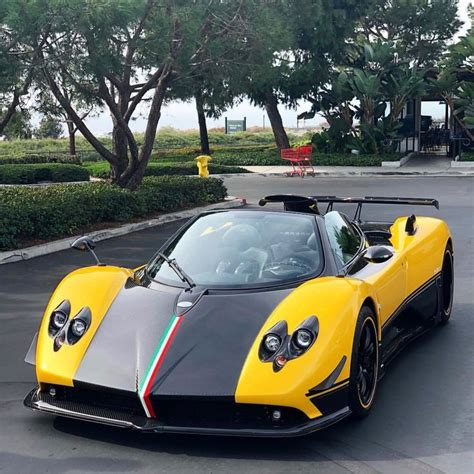 Pagani Zonda Cinque Roadster painted in Giallo w/ exposed carbon fiber and a Tricolore central ...