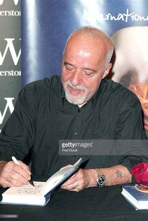 Paulo Coelho signing an autograph (photo owned by Getty Images) #authorsworking #authors #books ...