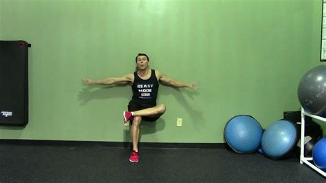 One Leg Wall Sit - HASfit Squat Exercise Demonstration - One Leg Wall Squat Form - Isometric ...