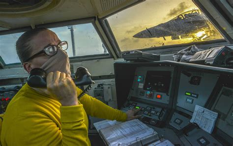 Lt. Amy Blades-Langjahr coordinates flight operations aboa… | Flickr